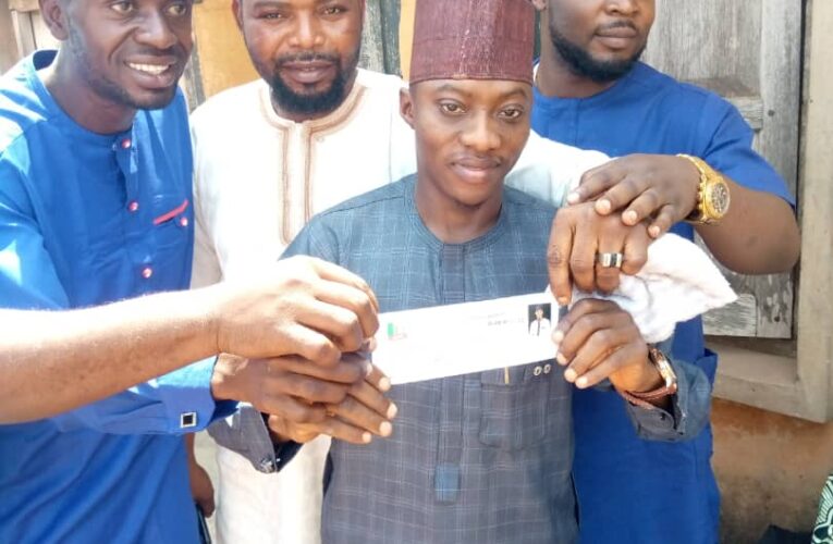 Hon. Faozey revalidates APC membership card