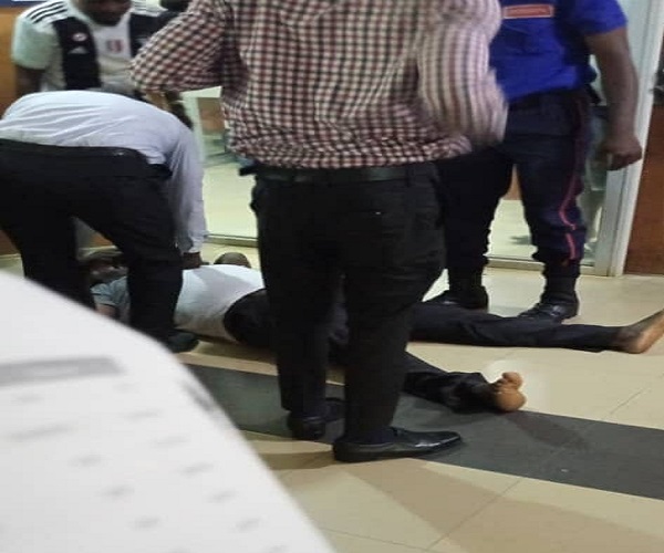 Tension as man slumps, dies on bank queue