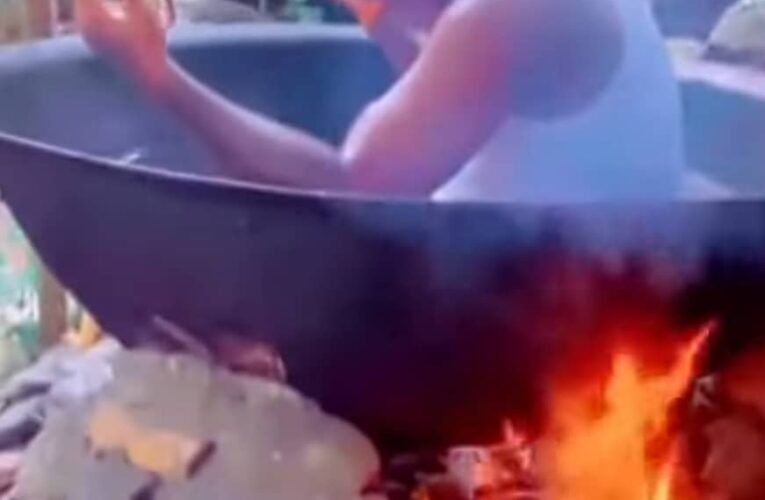VIDEO: Suspected Yahoo Boy Spotted Being Cooked Inside Big Pot 