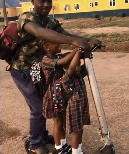 VIDEO: Soldier Takes Kids To School On Scooter 