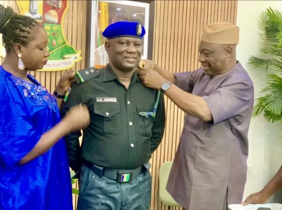 PHOTOS: Oyo Acting Gov decorates his excort commander, Adekunle Odejimi with new rank