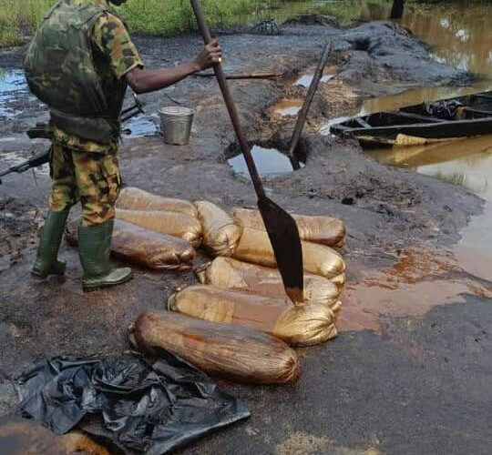 PHOTOS: Troops Destroy 15 Illegal Refineries, Recover 115,000 Litres Of Stolen Crude